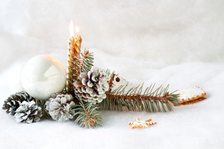 Christmas still life with golden candlesの写真素材