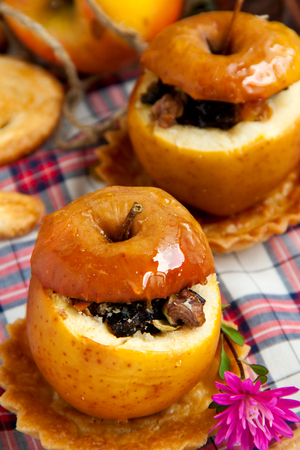 Helathy dessert - dried fruit stuffed baked applesの写真素材