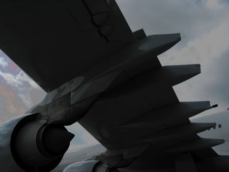 View under the wings of a big airplane. The darkness is intended as it gies the picture a special...