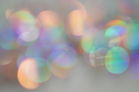 Abstract Blurred Iridescent Bokeh of Different Colors. Unfocused Colored Light with Holographic Effect.の写真素材