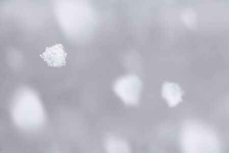 falling snow in winterの写真素材