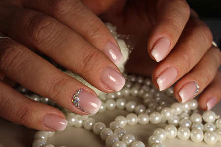 Manicure design gel with white lacquer Frenchの写真素材