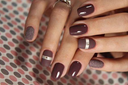 Youth manicure design, beautiful colors coffee nailsの写真素材