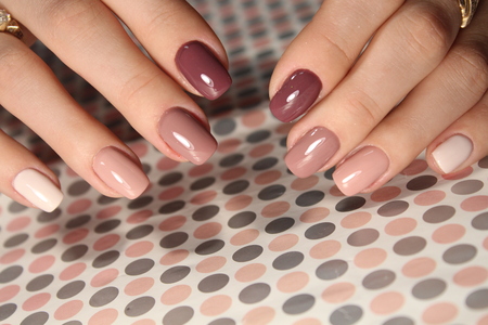 Youth manicure design, beautiful female hands with sexy manicure.の写真素材