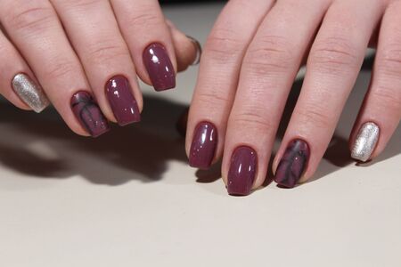 Manicure design nails varnish changes color. Thermoの写真素材