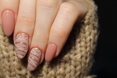 Youth manicure design, beautiful female hands with sexy manicure.の写真素材