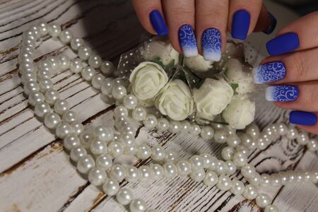 Nail art manicure. Beauty hands. Trendy Stylish Colorful Nails and Nailpolish. Manicure nail paint.の写真素材