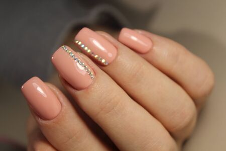 Nail art manicure. Beauty hands. Trendy Stylish Colorful Nails and Nailpolish. Manicure nail paint.の写真素材