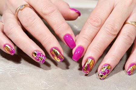 Hands with beautiful manicure. Natural nails with gel polishの写真素材