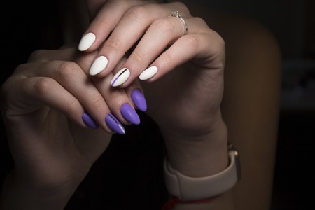 Women's hands with a stylish manicure. Bestの写真素材