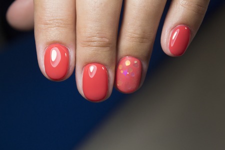 Summer manicure and nail color samples. Young woman hands with multicoloredの写真素材