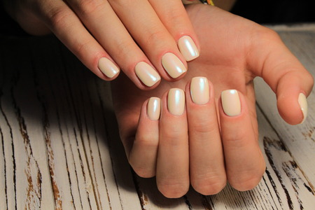 fashion manicure with a design on a beautiful textureの写真素材