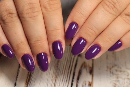 Amazing natural nails. Women's hands with clean manicure.