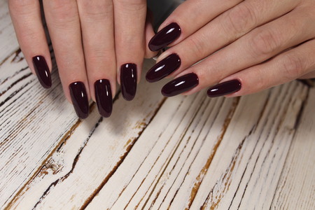 Amazing natural nails. Women's hands with clean manicure.