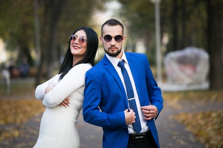 man with girl playfully posing