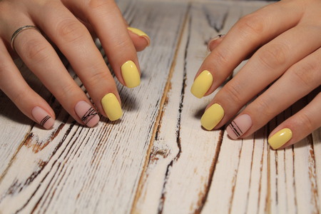Beautiful woman's nails with beautiful christmas manicure studio