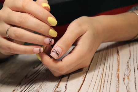 Beautiful woman's nails with beautiful christmas manicure studio