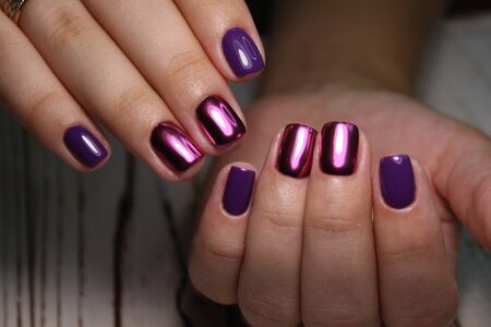 Bright neon manicure on female hands. Nail design. Beauty handsの写真素材