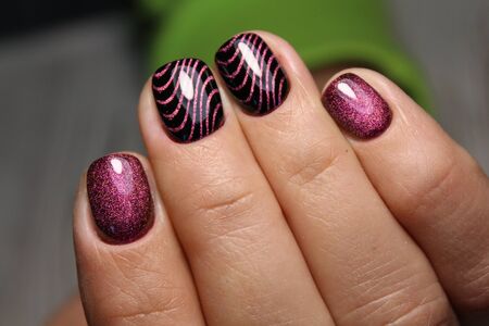 Amazing natural nails. Women's hands with clean manicure. Gel polish applied.