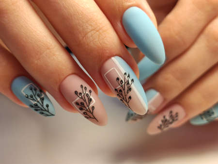fashion manicure of nails on a beautiful backgroundの写真素材