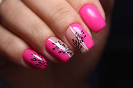 Trendy manicure design on a beautiful background.の写真素材