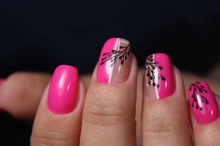 beautiful manicure of nails on the background of a fashionableの写真素材