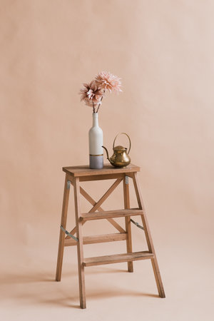 Artificial flowers in a vase. Studio photography of flowers. Very beautiful decorative flowers....