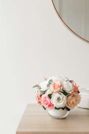 bouquet of artificial flowers on a white background. interiorの写真素材