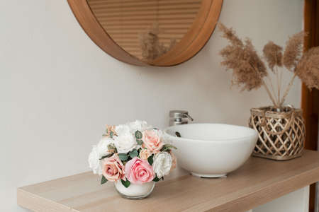 decorative flowers on a beautiful table top.の写真素材