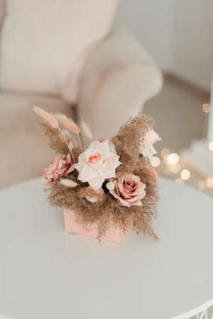 artificial minimalistic flowers in a pink box.の写真素材
