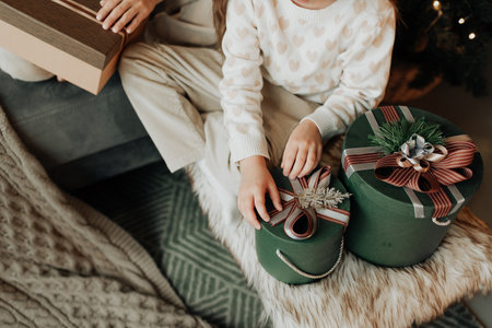 girl makes New Year's gifts. Gift ideas for the new year. Gifts