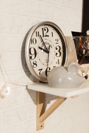 interior decoration for hours. Unusual round hours. White wallの写真素材
