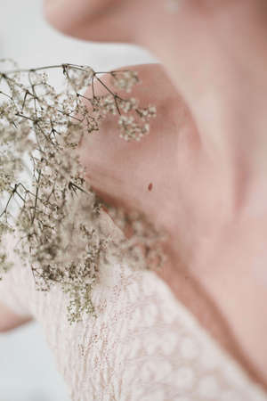 female collarbone and flowers. The female body. Abstractionの写真素材