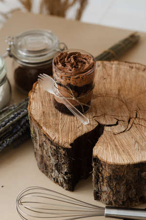sweet coffee chocolate pudding and wood cut close up wood textureの写真素材
