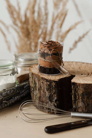 sweet chocolate pudding and wood cut on table kitchen decorの写真素材