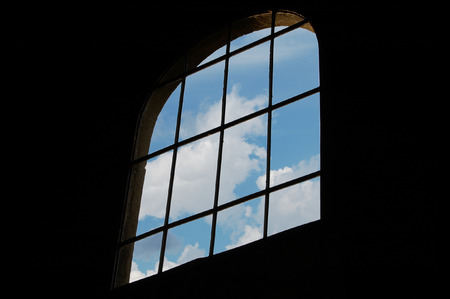 Window with a lattice on a background of the skyの写真素材