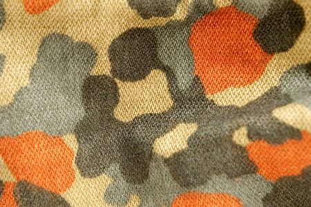 the fabric military camouflage backgroundの写真素材