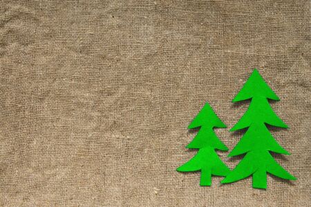 background from sackcloth and fir-treeの写真素材