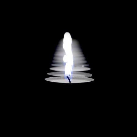 small candles cost on black backgroundの写真素材