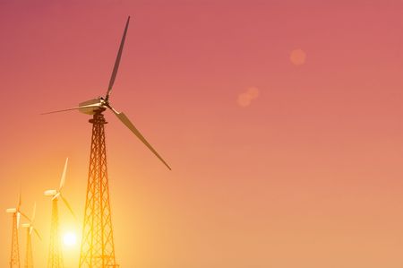 turbine on pink evening sky background 