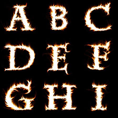 blazing alphabet isolated on blackの写真素材