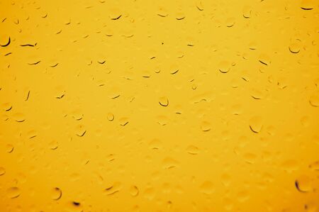 the abstract beer drop backgroundの写真素材