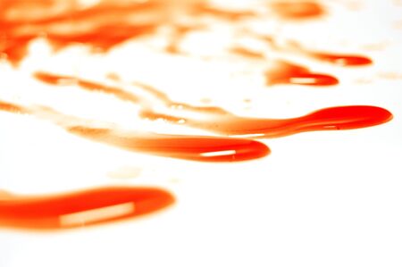 abstract blood background isolated on white の写真素材