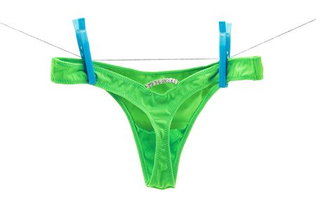 green bikini isolated on whiteの写真素材