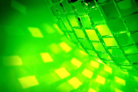 green disco ball close upの写真素材