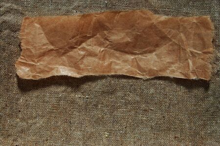 paper piece on cotton backgroundの写真素材