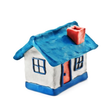 small plasticine house isolated on whiteの写真素材