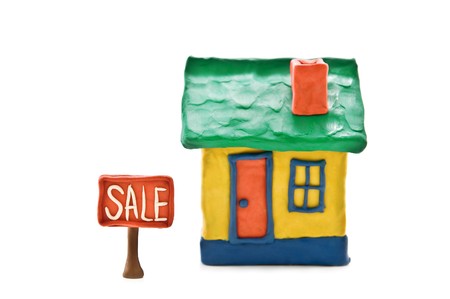 small plasticine house isolated on whiteの写真素材