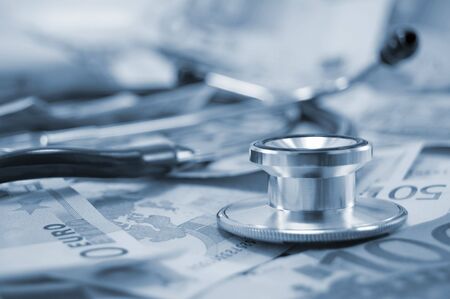 stethoscope and pills on euro noteの写真素材