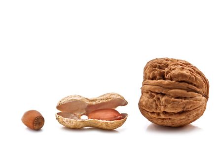 three different nuts isolated on white